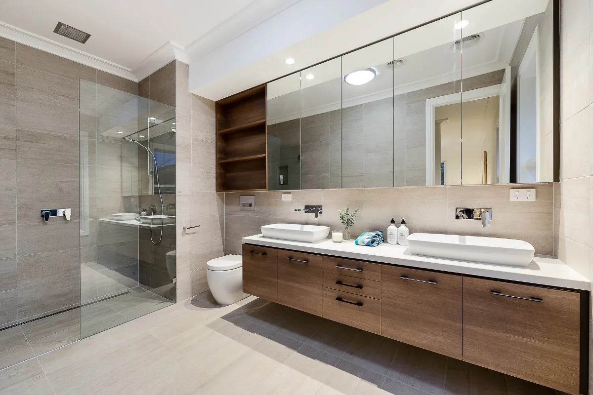 Modern bathroom renovation with walk in shower and double vanity unit