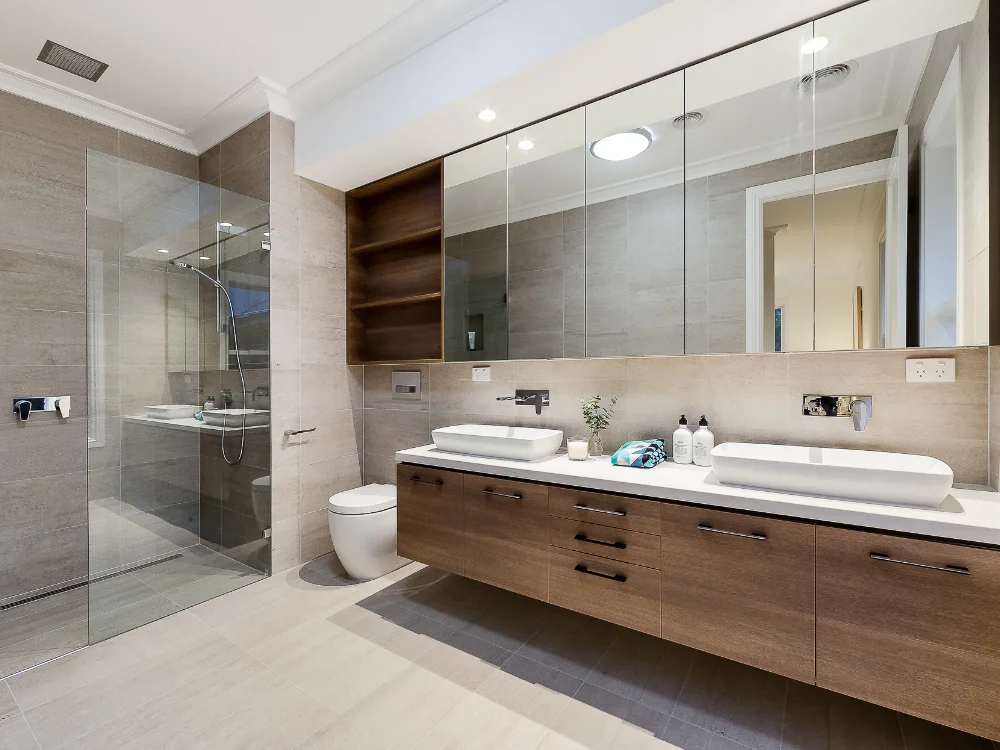 Luxury bathroom renovation with walk in shower and double vanity unit